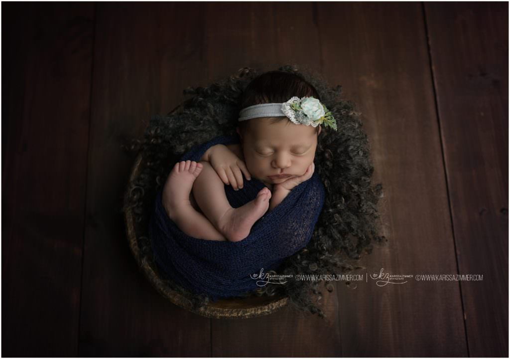 photographer karissa zimmer photographed newborn girl in bowl