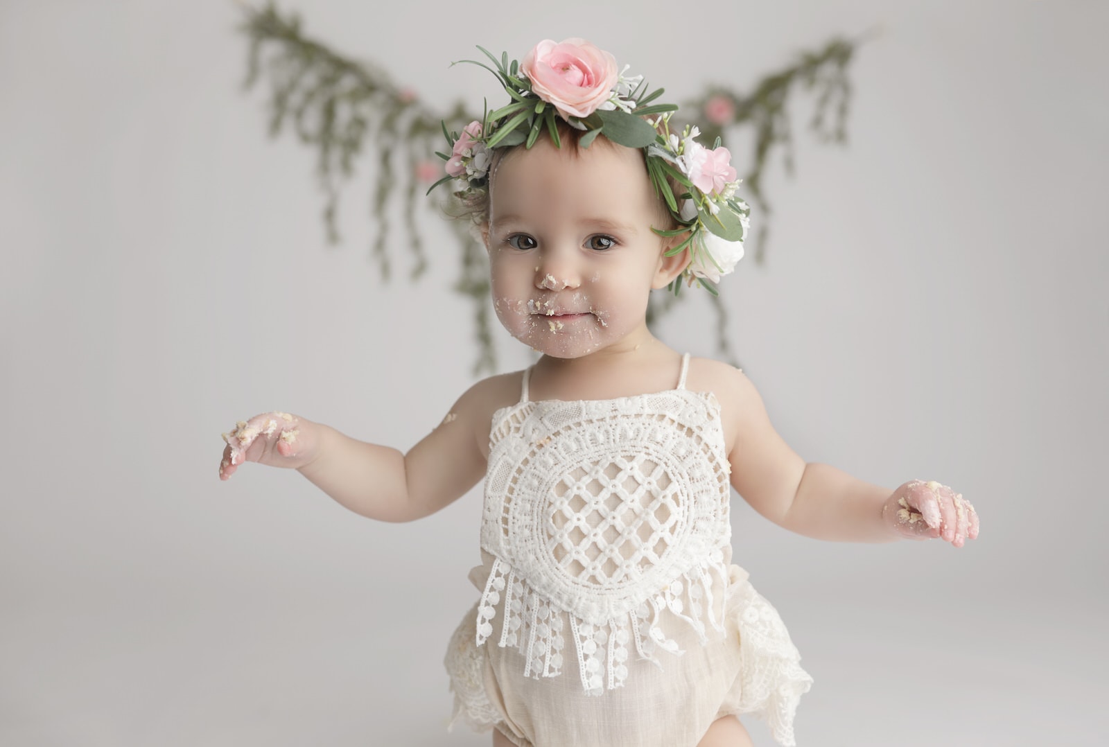 mechanicsburg baby photographer photographs one year old girl during cake smash shoot