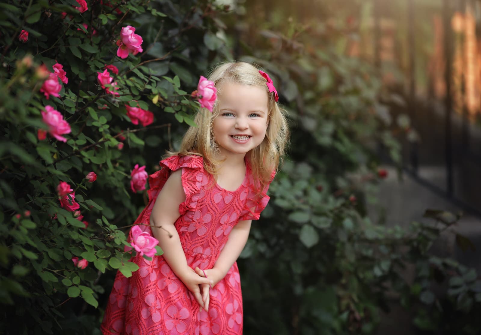 Harrisburg baby photographer little girl smiles happily during photoshoot near Mechanicsburg PA