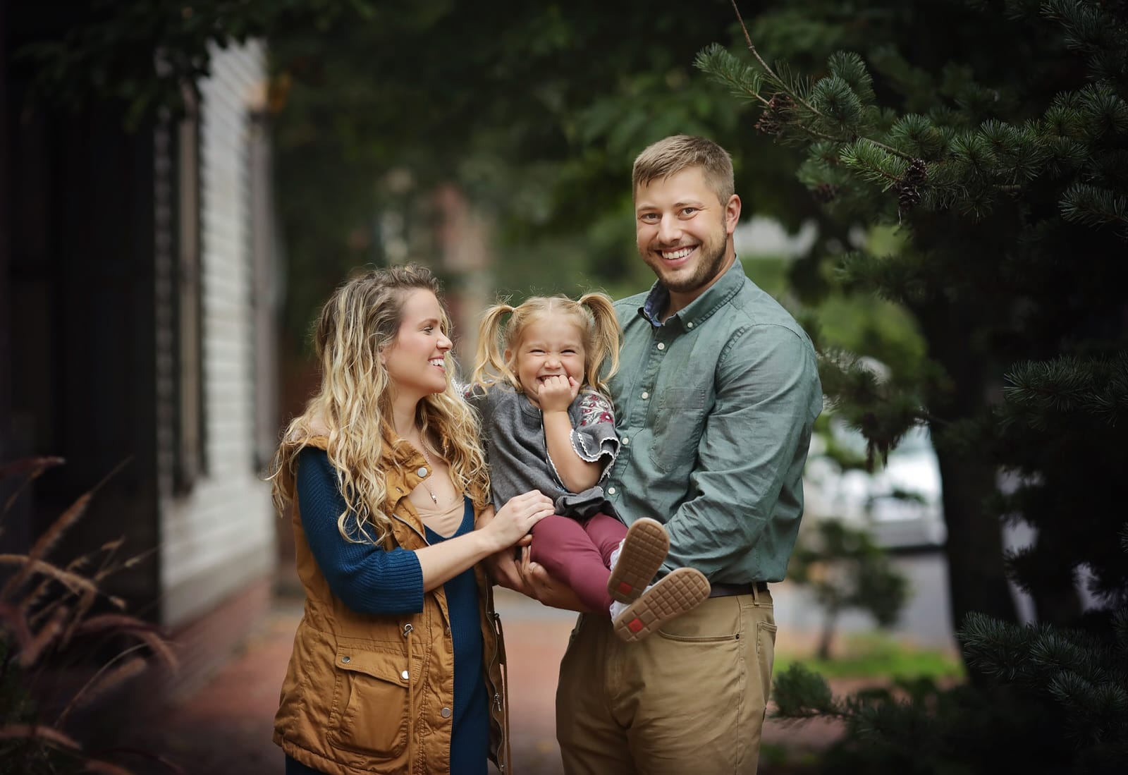 family of 3 photographed outdoors in harrisburg pa by family photographer karissa zimmer photography
