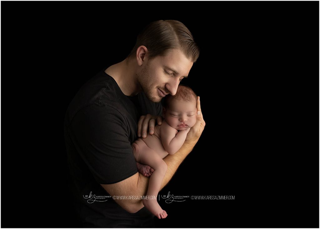 new father is photographed during photo session with karissa zimmer photography