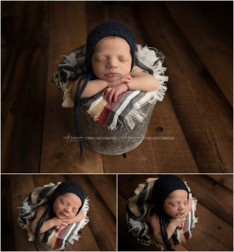 baby boy posed in bucket and photographed by mechanicsburg pa best newborn photographer