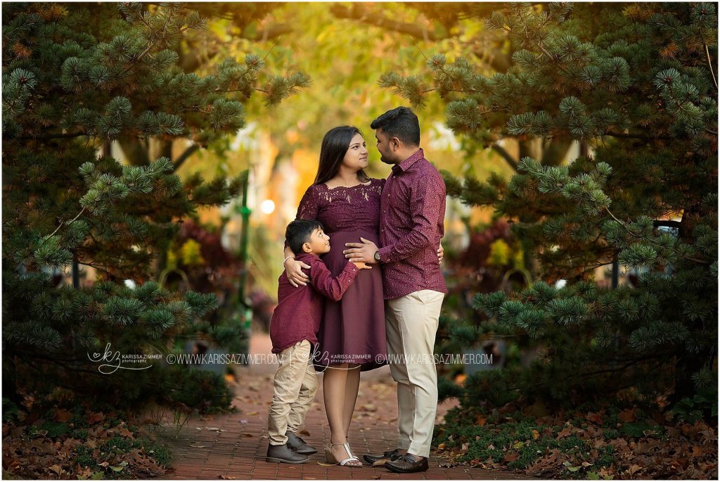 family poses together during their camp hill maternity photography session with karissa zimmer phtography