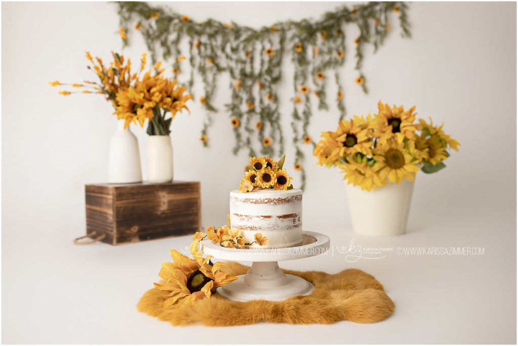 sunflower cake designed for cake smash photography session in camp hill baby photography Studio