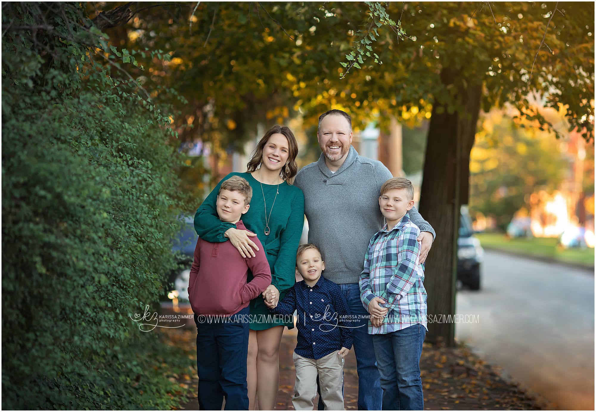 Family of 5 poses together during their fall family photography session with Camp Hill Family Photographer