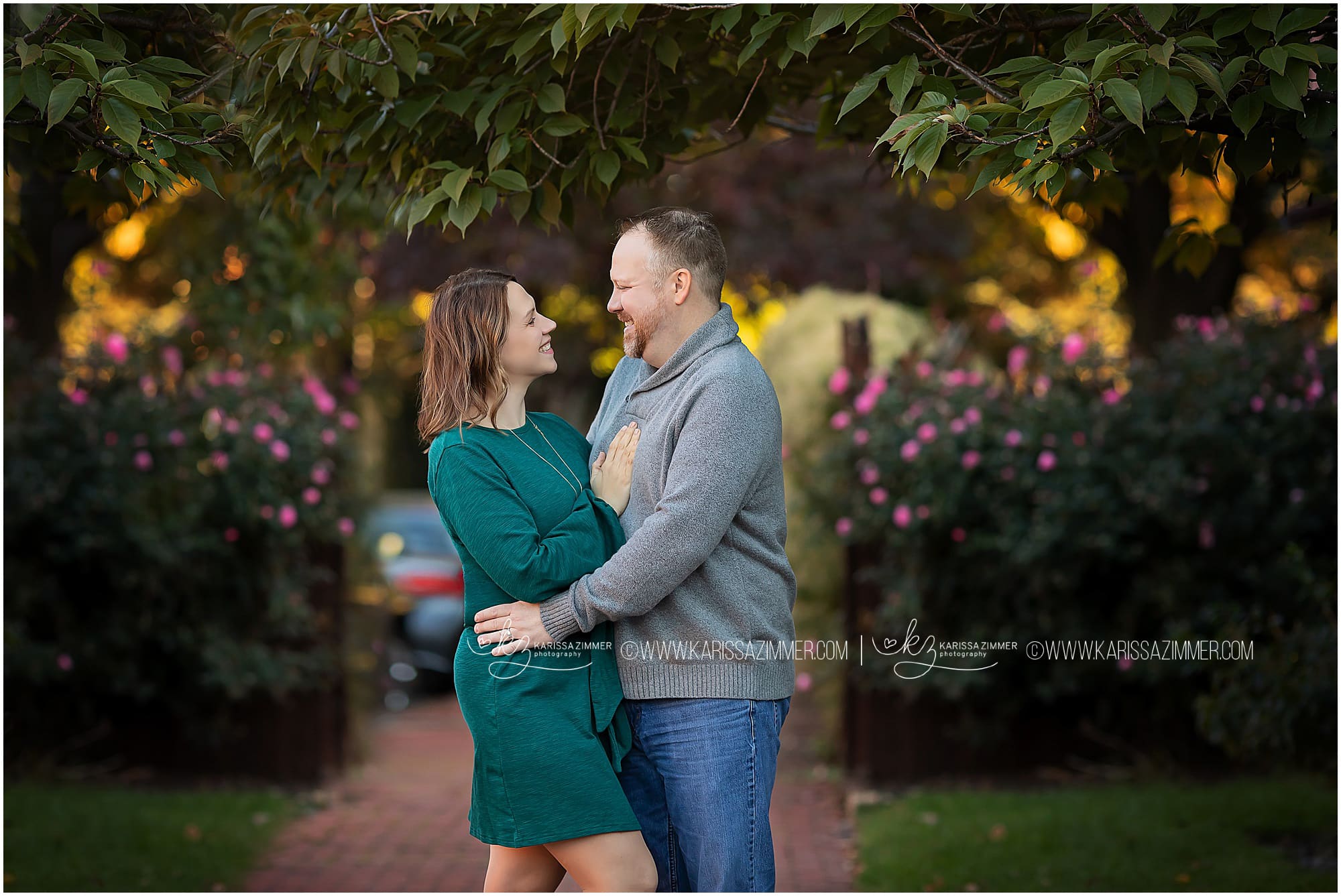 Husband and Wife embrace one another during their photo session with Camp Hill Family Photographer