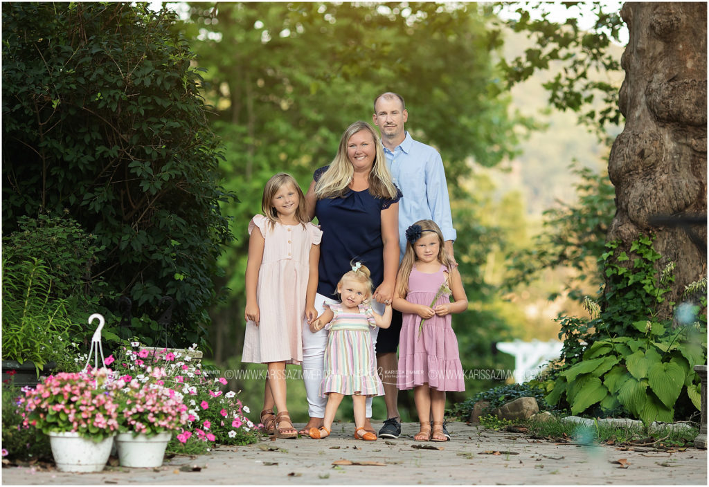 Harrisburg PA Family of 5 poses together at their outdoor family Photography session at The Peter Allen House