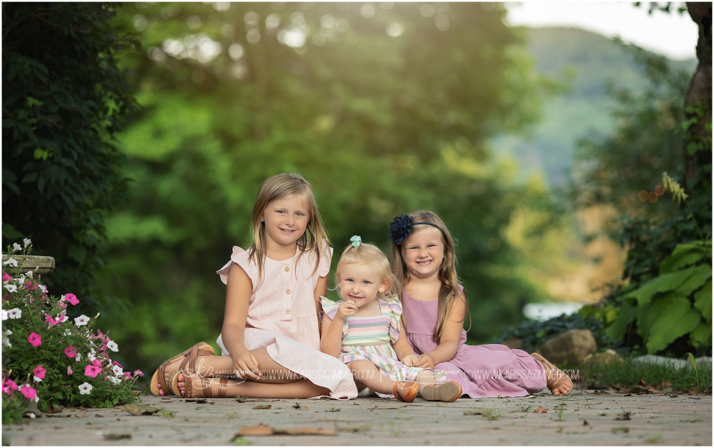 3 Young Sisters are photographed together by family photographer, Karissa Zimmer Photography