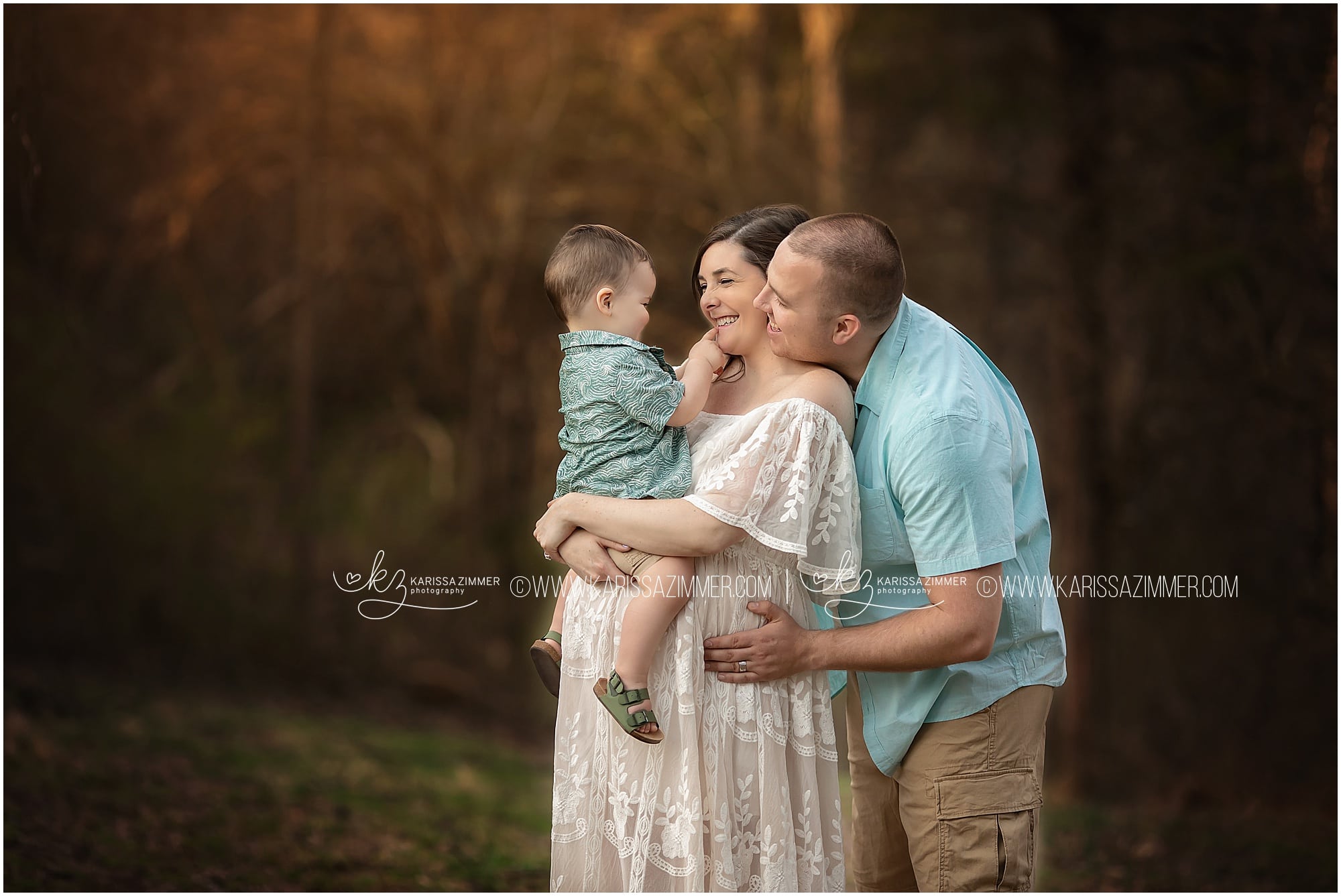 mother and father laugh with their child during their family and maternity photography session with maternity photographer karissa zimmer photography