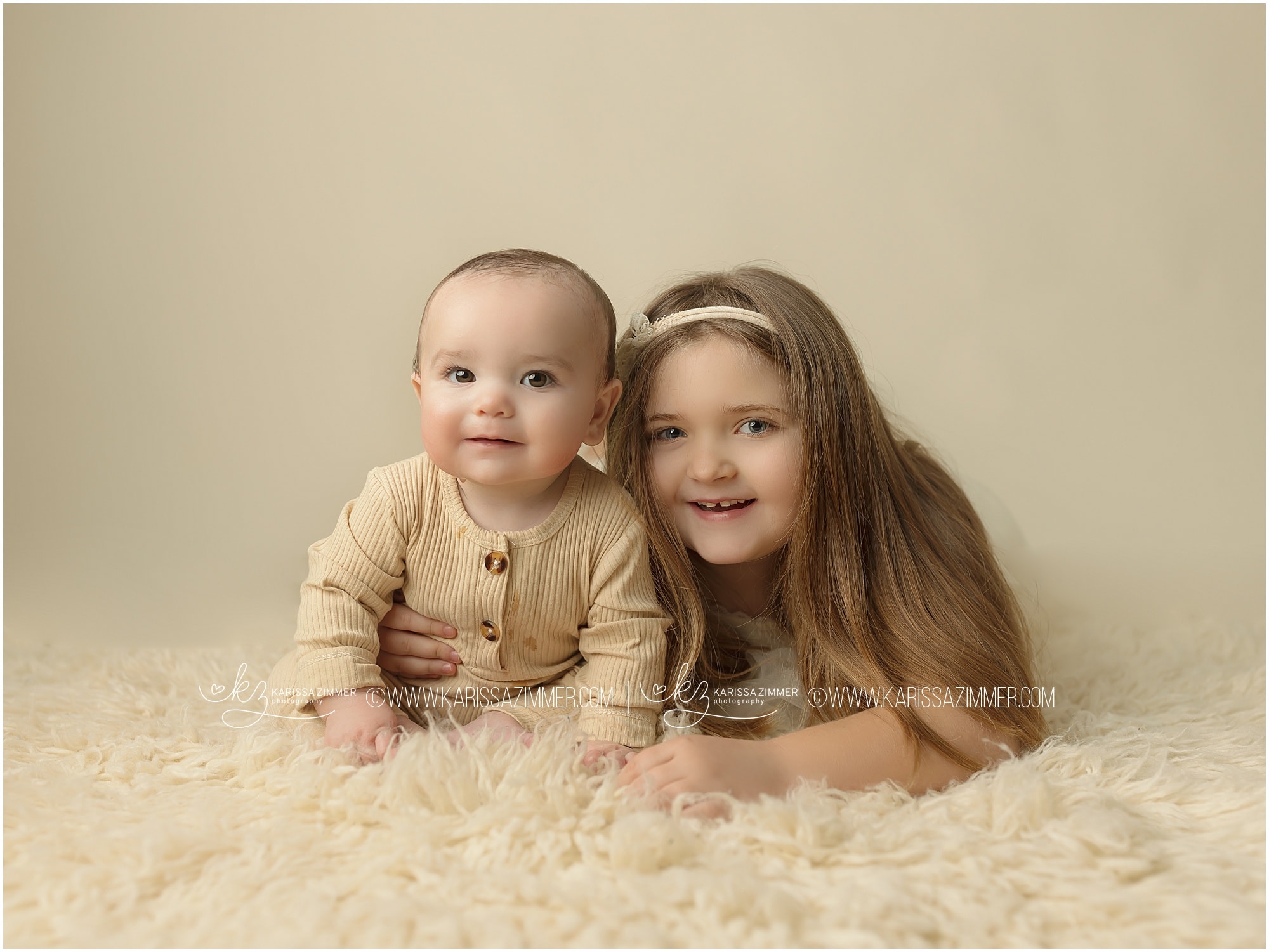 big sister and baby brother portrait