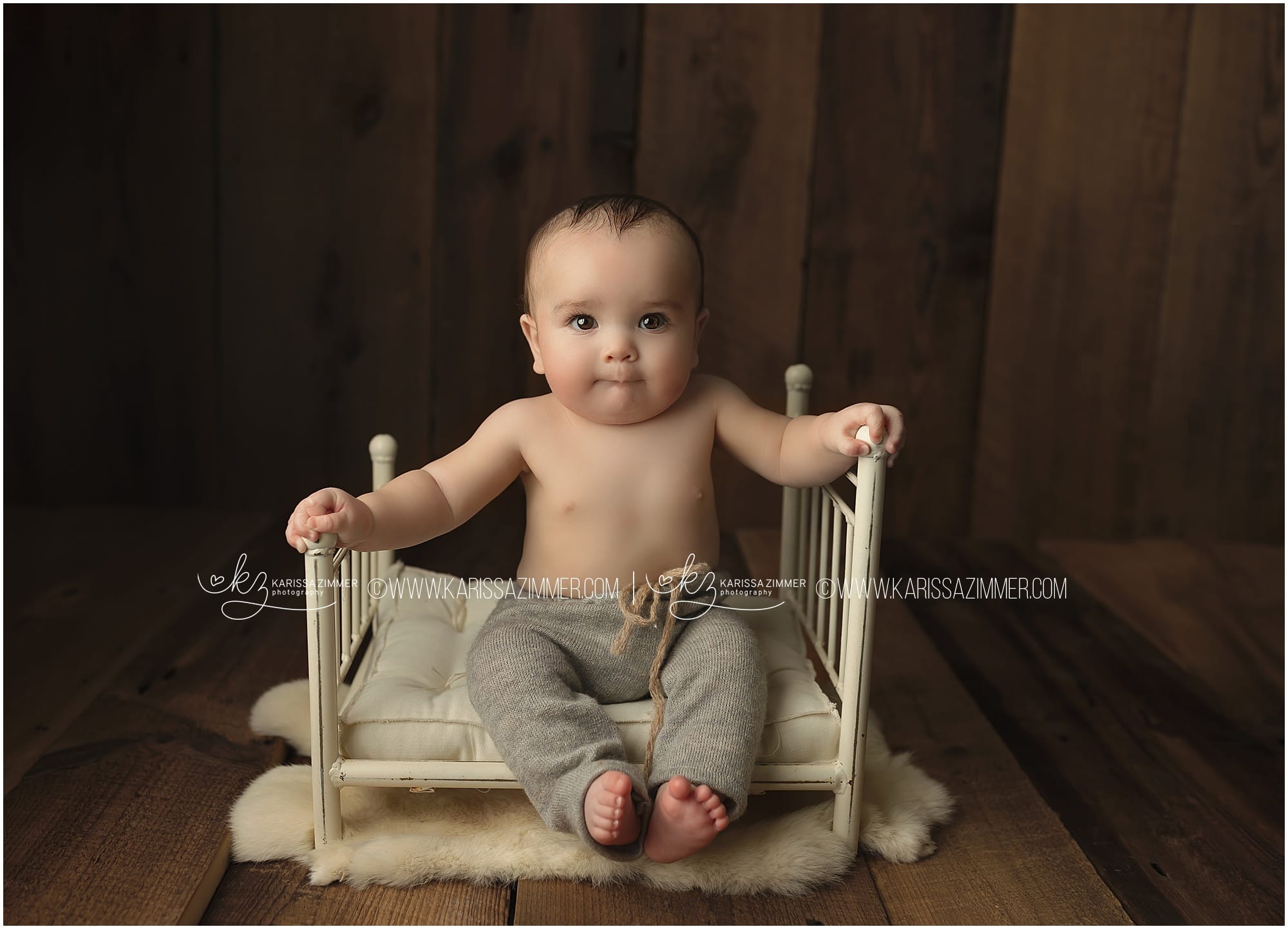 6 month old baby boy photographed by baby photographer karissa zimmer