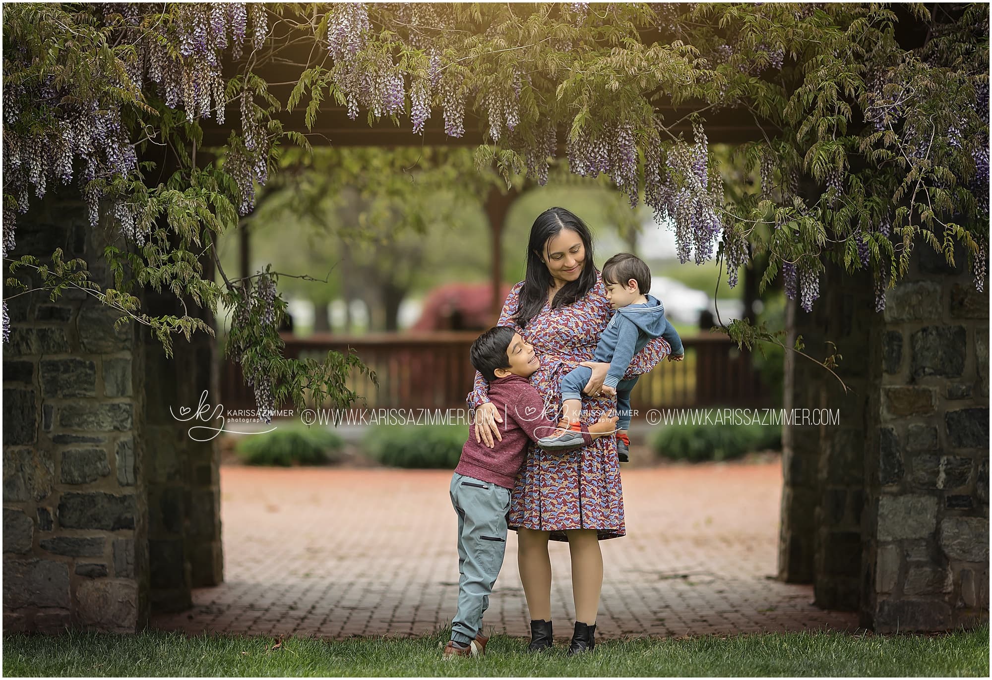 Mother and sons photographed together at outdoor family photography session