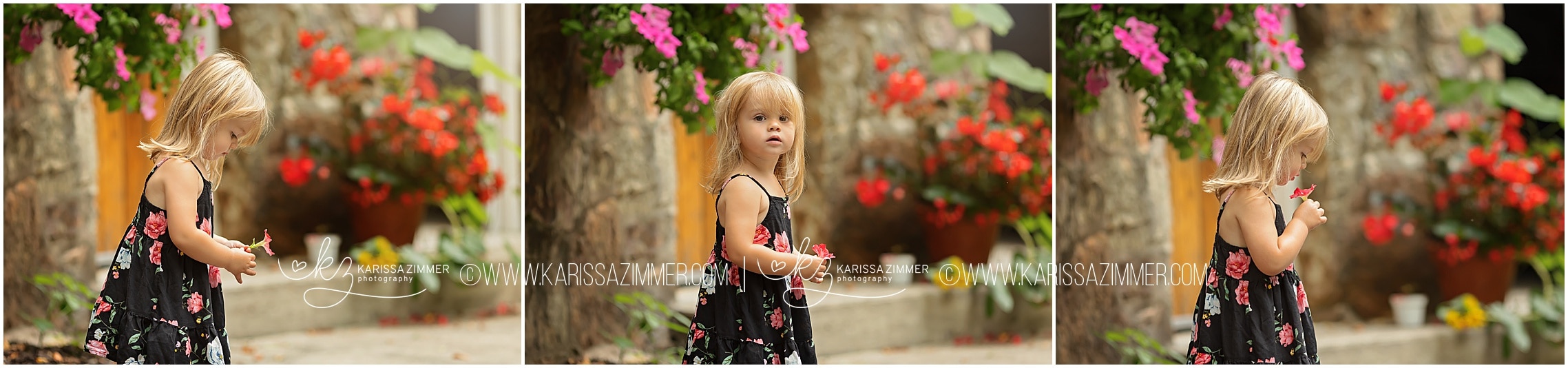 little girl smells a flower at her family photoshoot