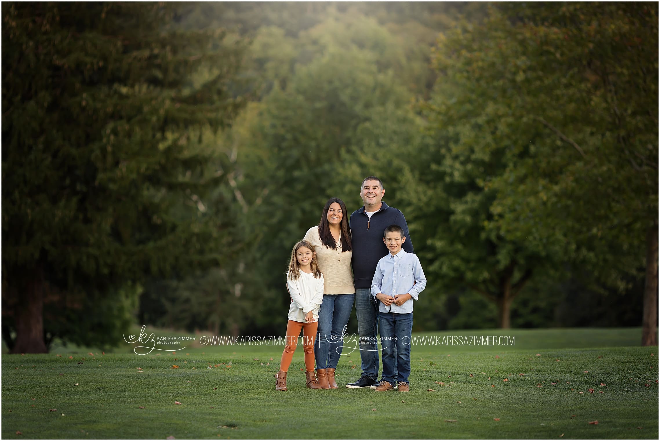 Family poses together at their outdoor fall family photography session near Harrisburg PA