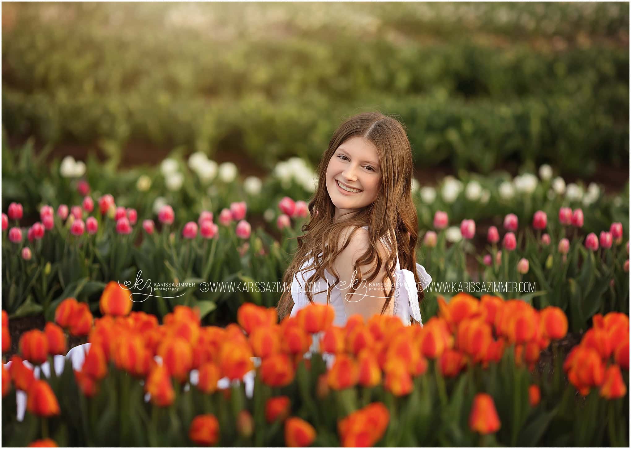 Poses for High school senior girl flower field photography.