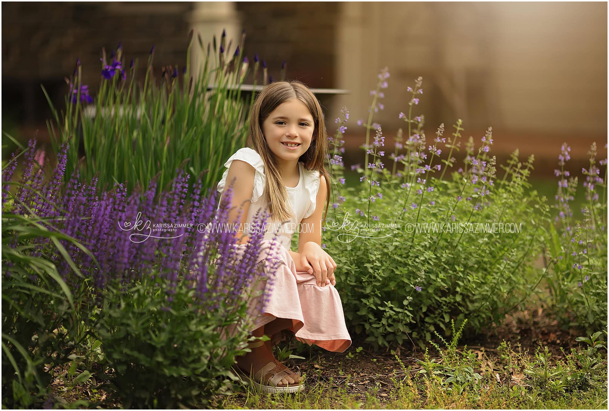 A young girl poses to have her picture taken in Harrisburg PA during her family photoshoot