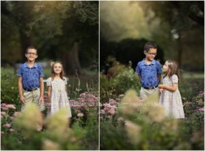 A young brother and sister are photographed together in a a field of purple autumn flowers